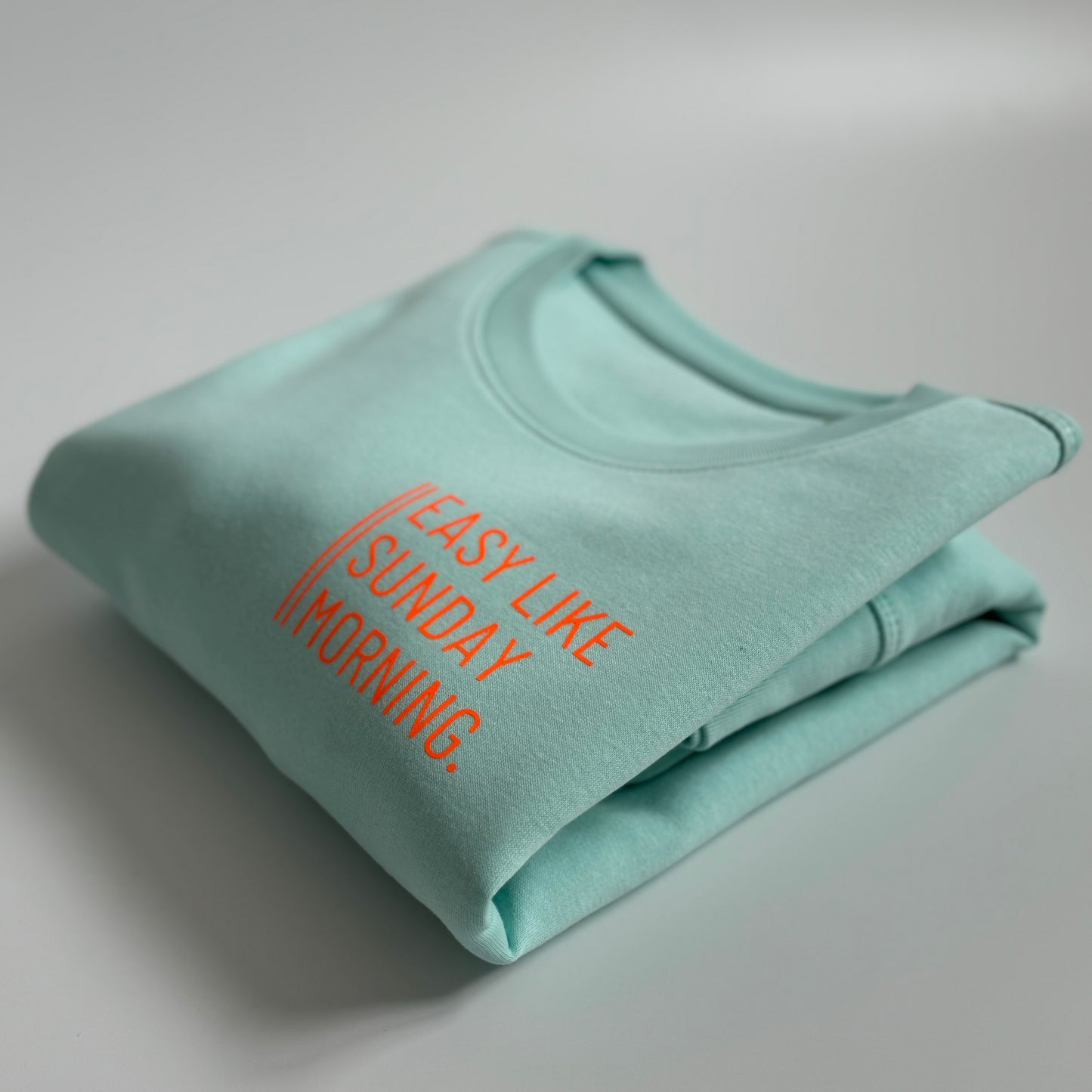 Sweatshirt Unisex 'Easy like Sunday morning.': Caribean Blue / Neon Orange