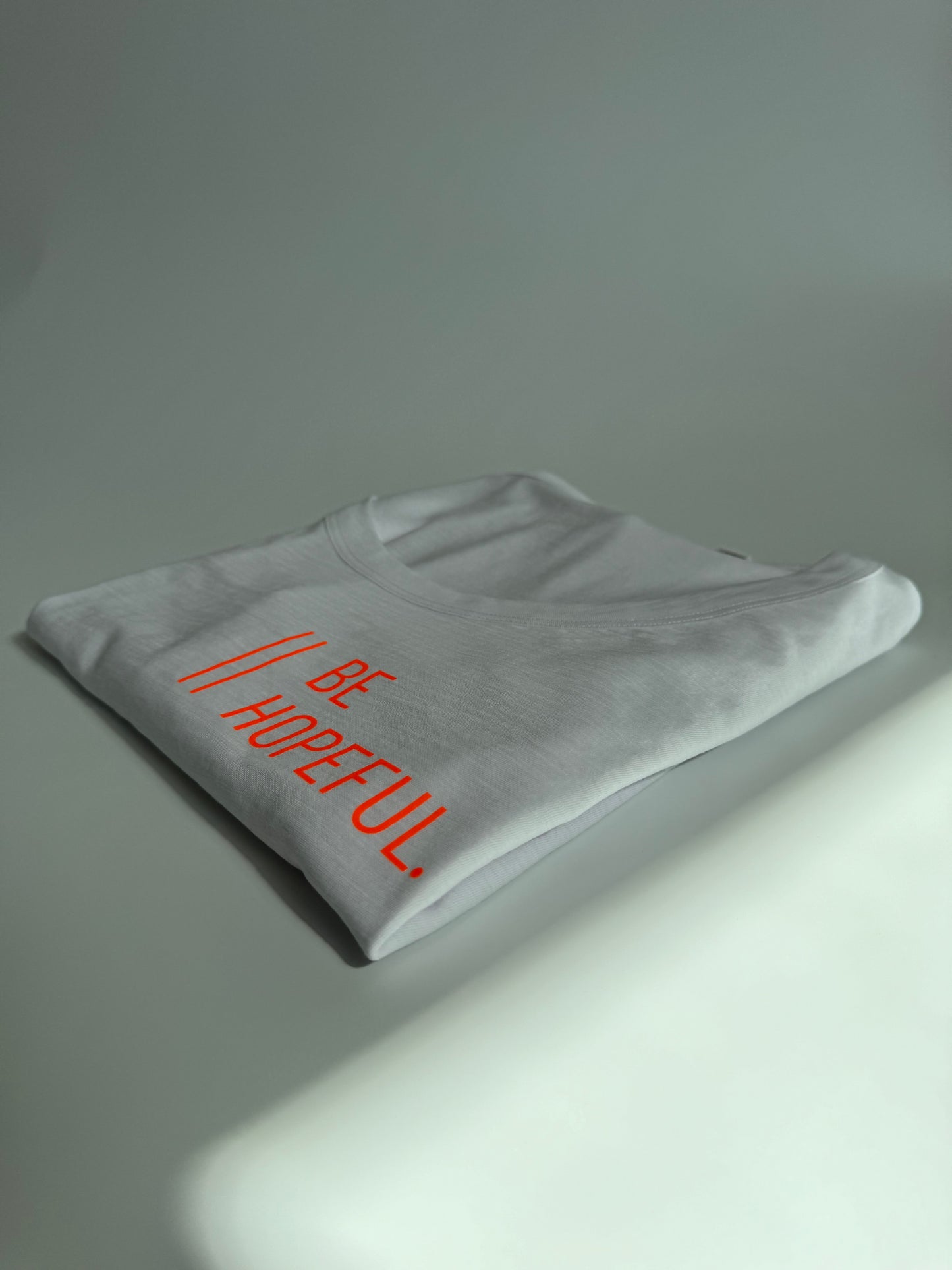 T-Shirt Frauen 'Be hopeful.': weiß / neon orange