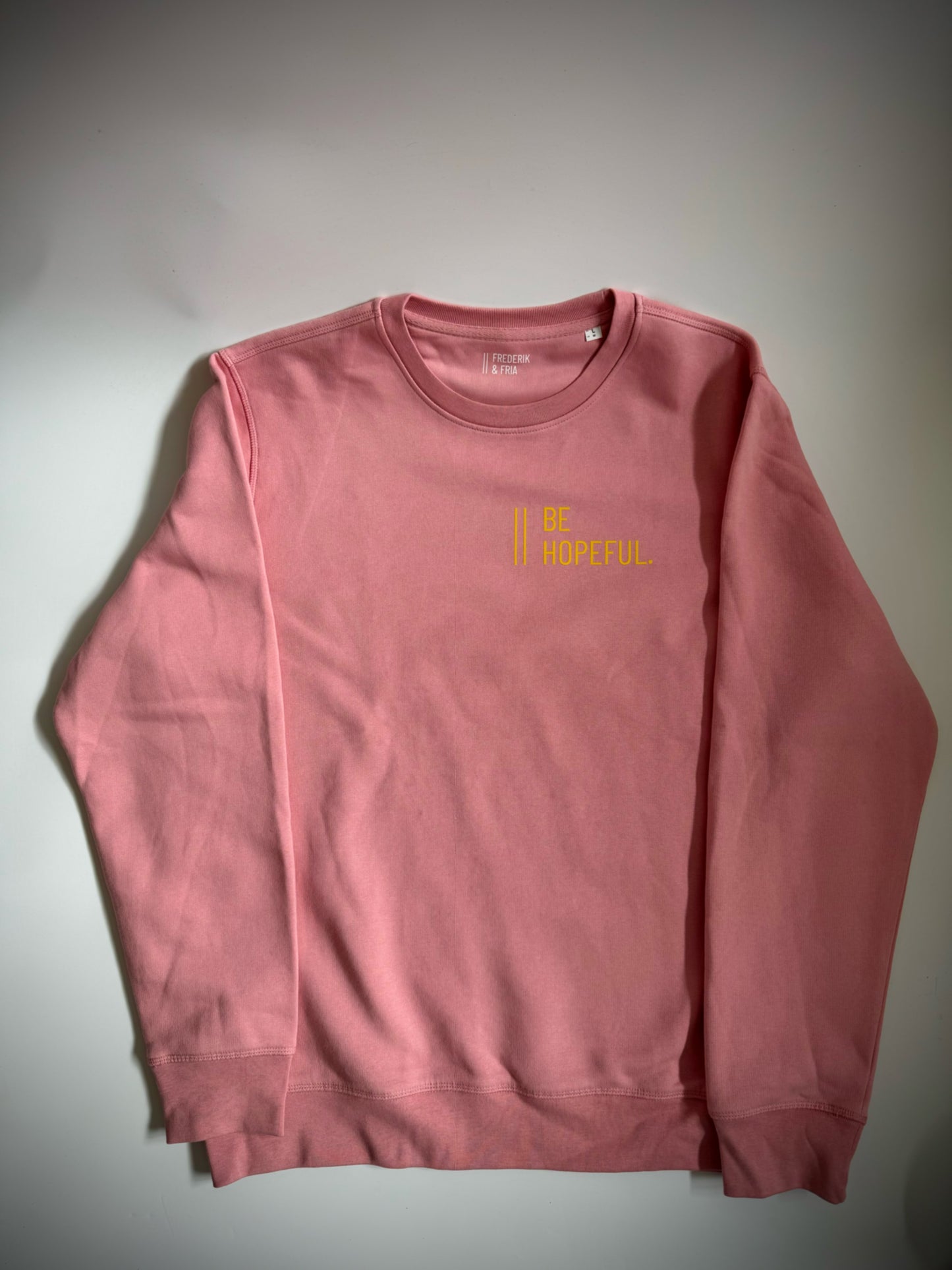 Sweatshirt Unisex 'Be hopeful.': Canyon Pink / Gelb