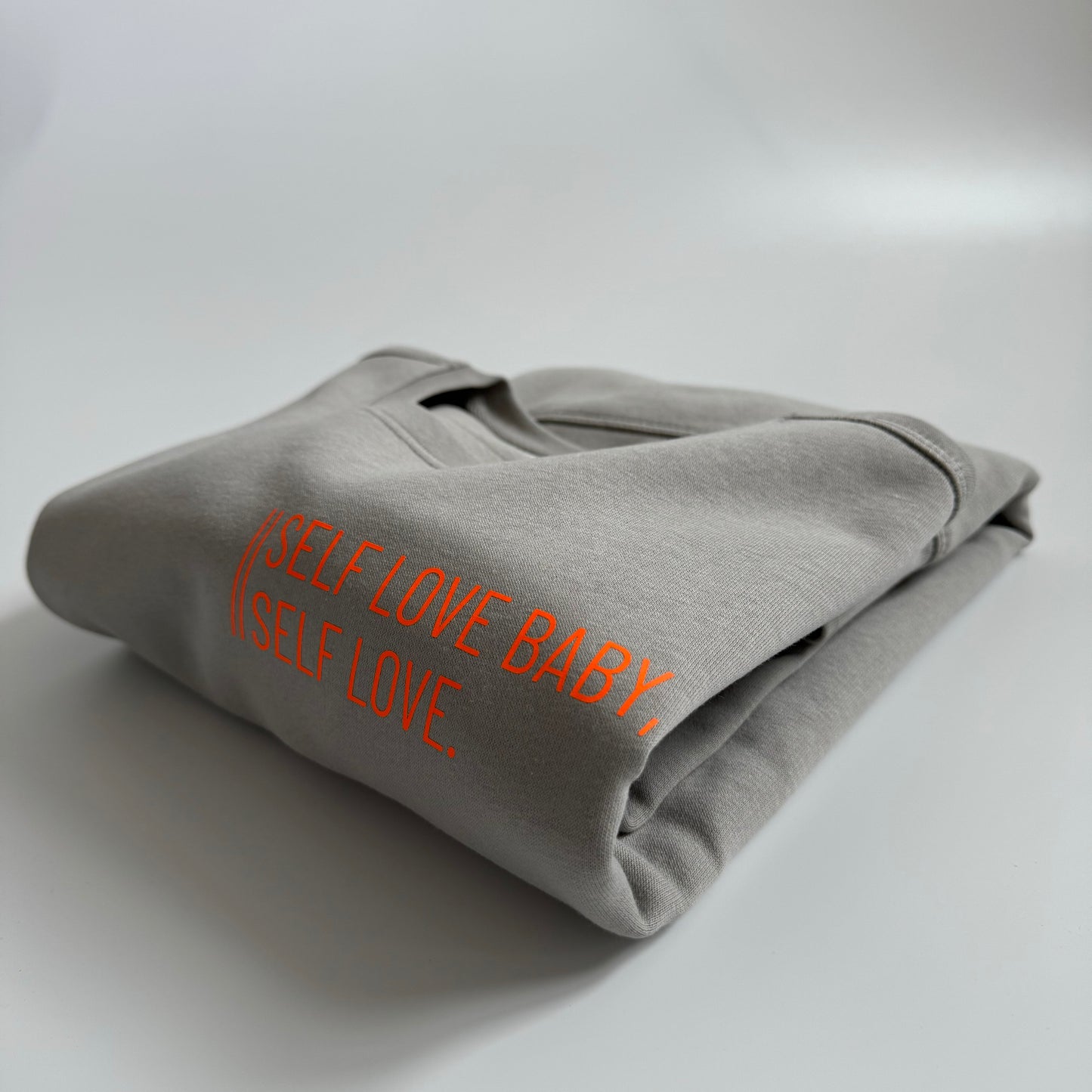 Sweatshirt Unisex 'Self love baby, self love.': Opal Grau / Neon Orange