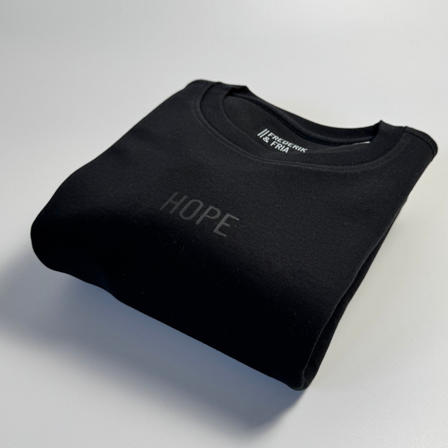 Sweatshirt Unisex 'HOPE.': Schwarz / Schwarz