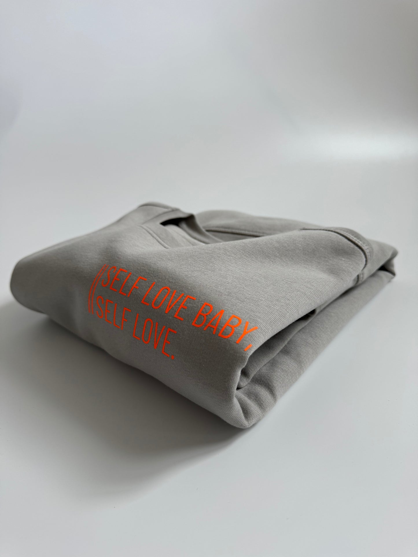 Sweatshirt Unisex 'Self love baby, self love.': Opal Grau / Neon Orange