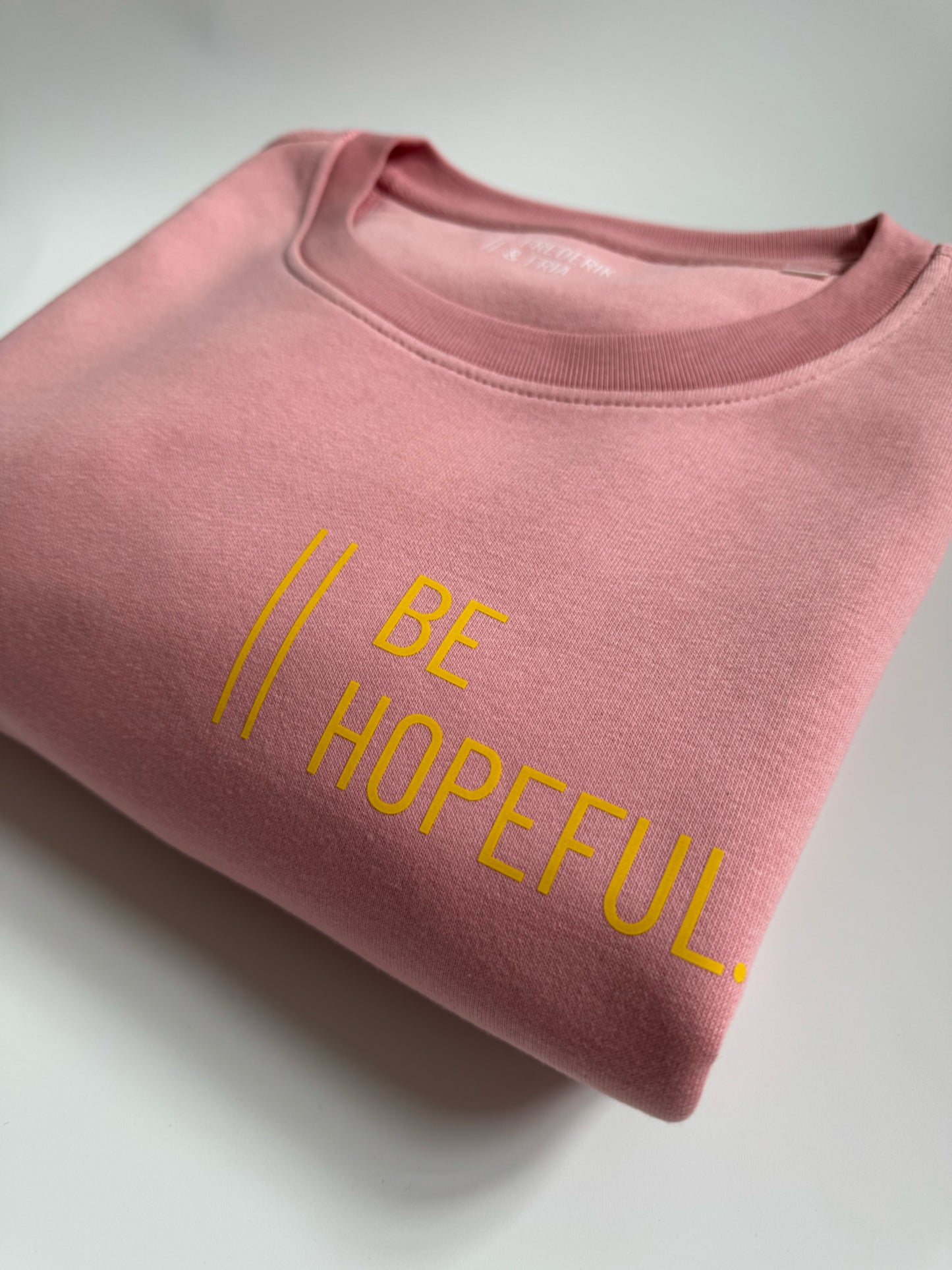 Sweatshirt Unisex 'Be hopeful.': Canyon Pink / Gelb