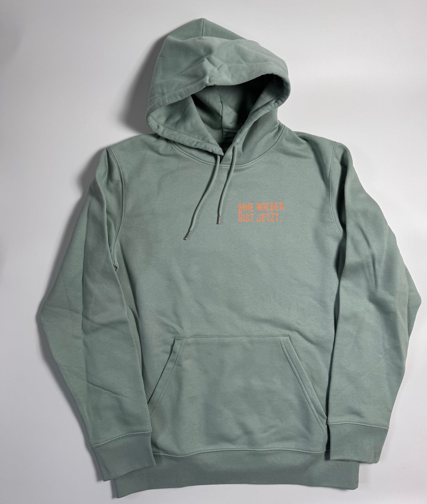 Hoodie Unisex 'Nie wieder ist jetzt.': Aloe / Neon Orange