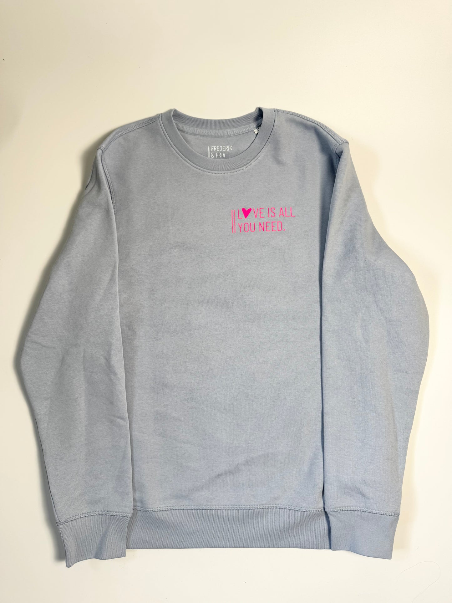 Sweatshirt Unisex 'Love is all you need.': Serene Blue / Neon Pink