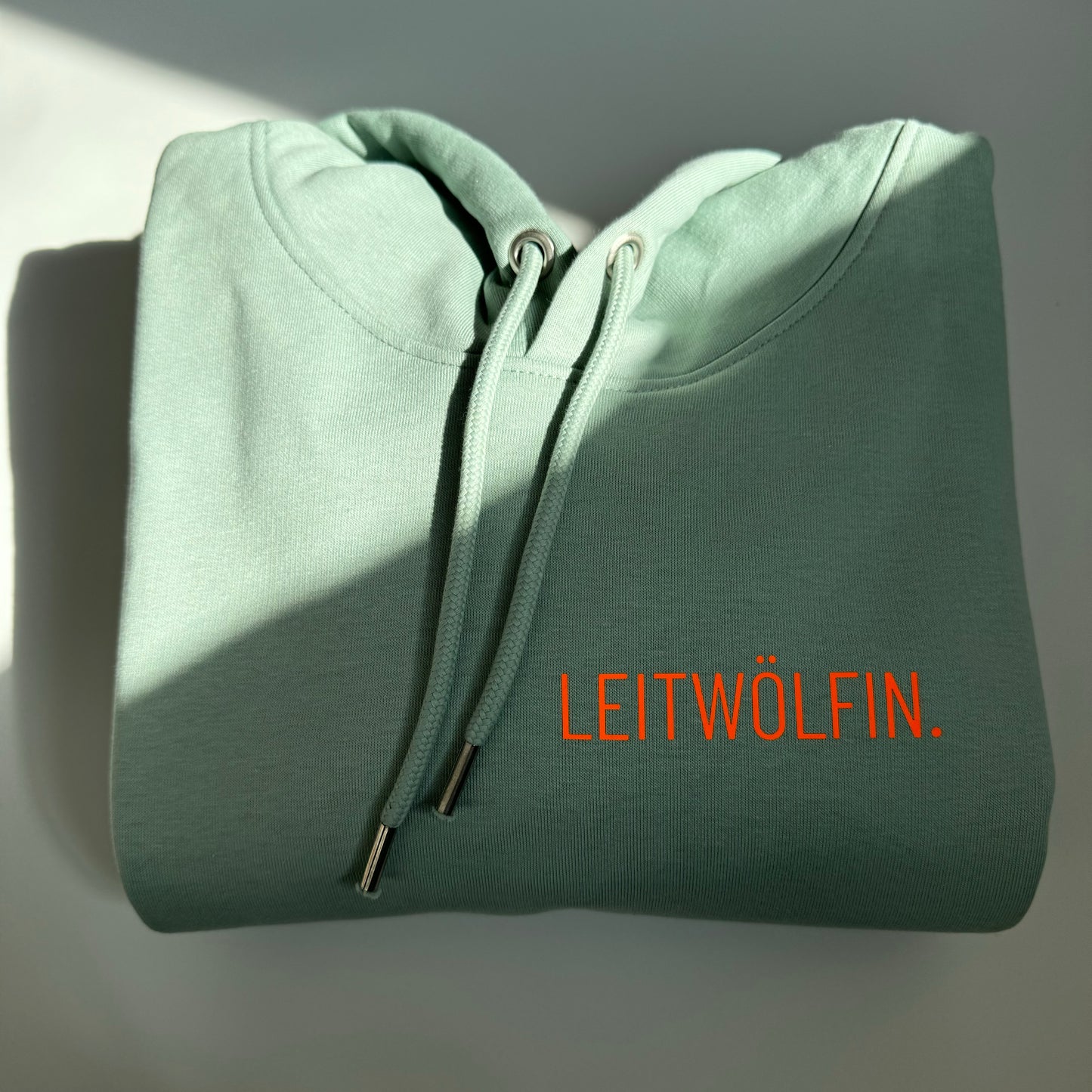 Hoodie Unisex 'Leitwölfin / Leitwolf.': Aloe / Neon Orange