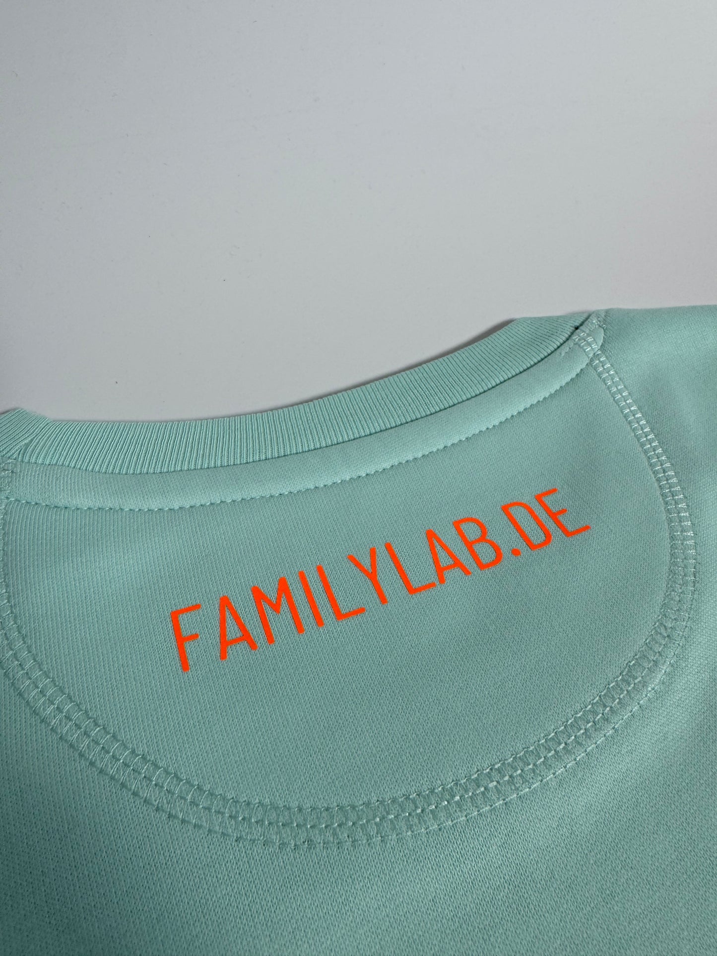 Sweatshirt Unisex 'Leitwölfin / Leitwolf.': Caribean Blue / Neon Orange