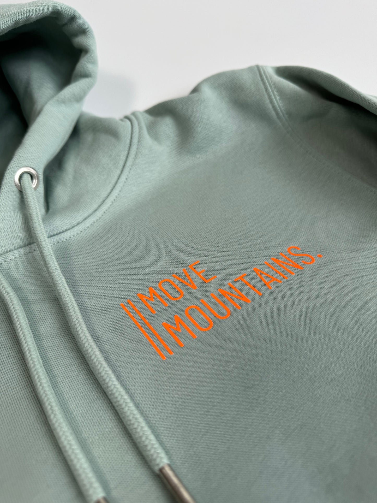 Hoodie Unisex 'Move Mountains.': Senf, Aloe / Neon Orange