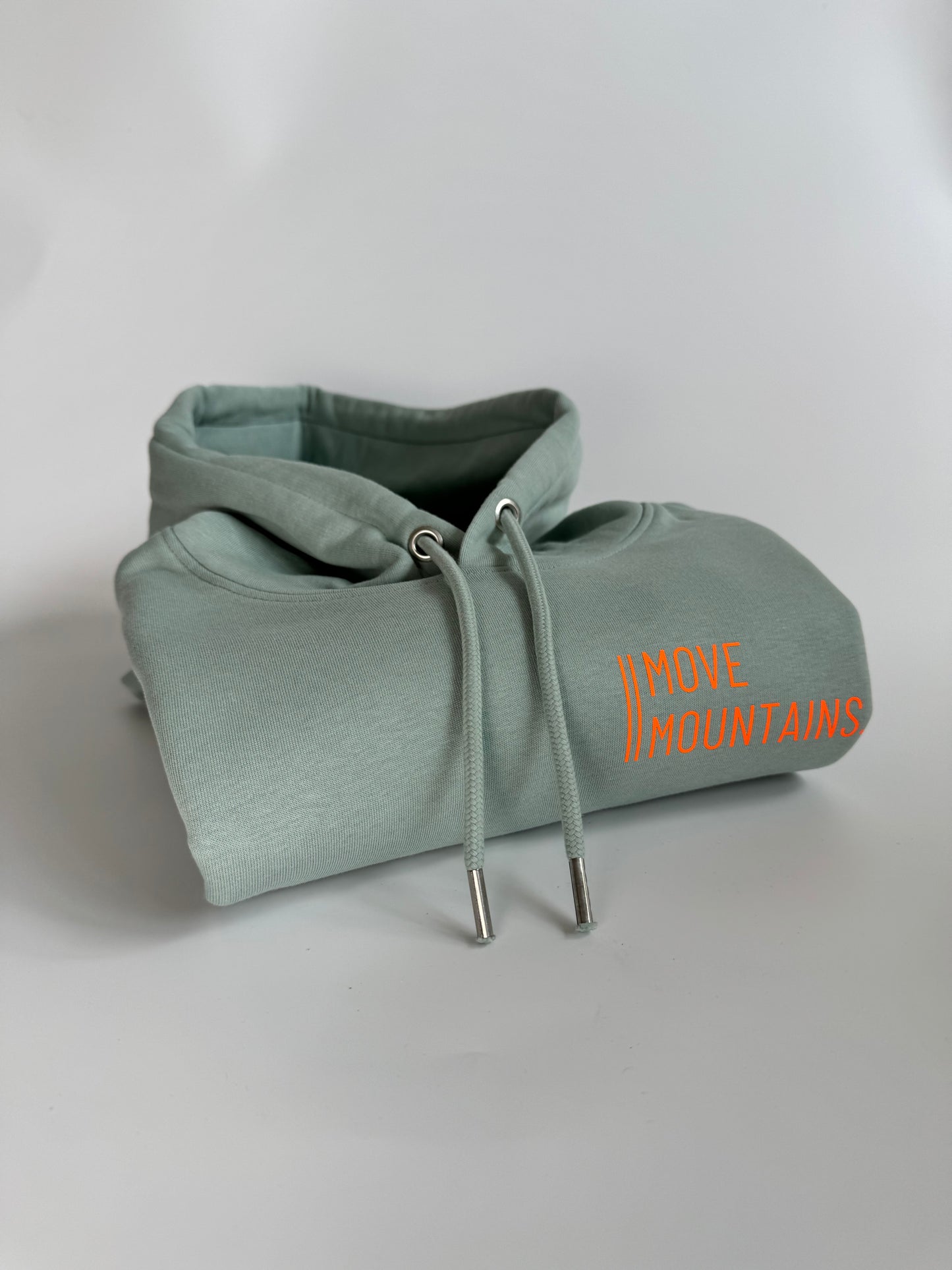 Hoodie Unisex 'Move Mountains.': Senf, Aloe / Neon Orange