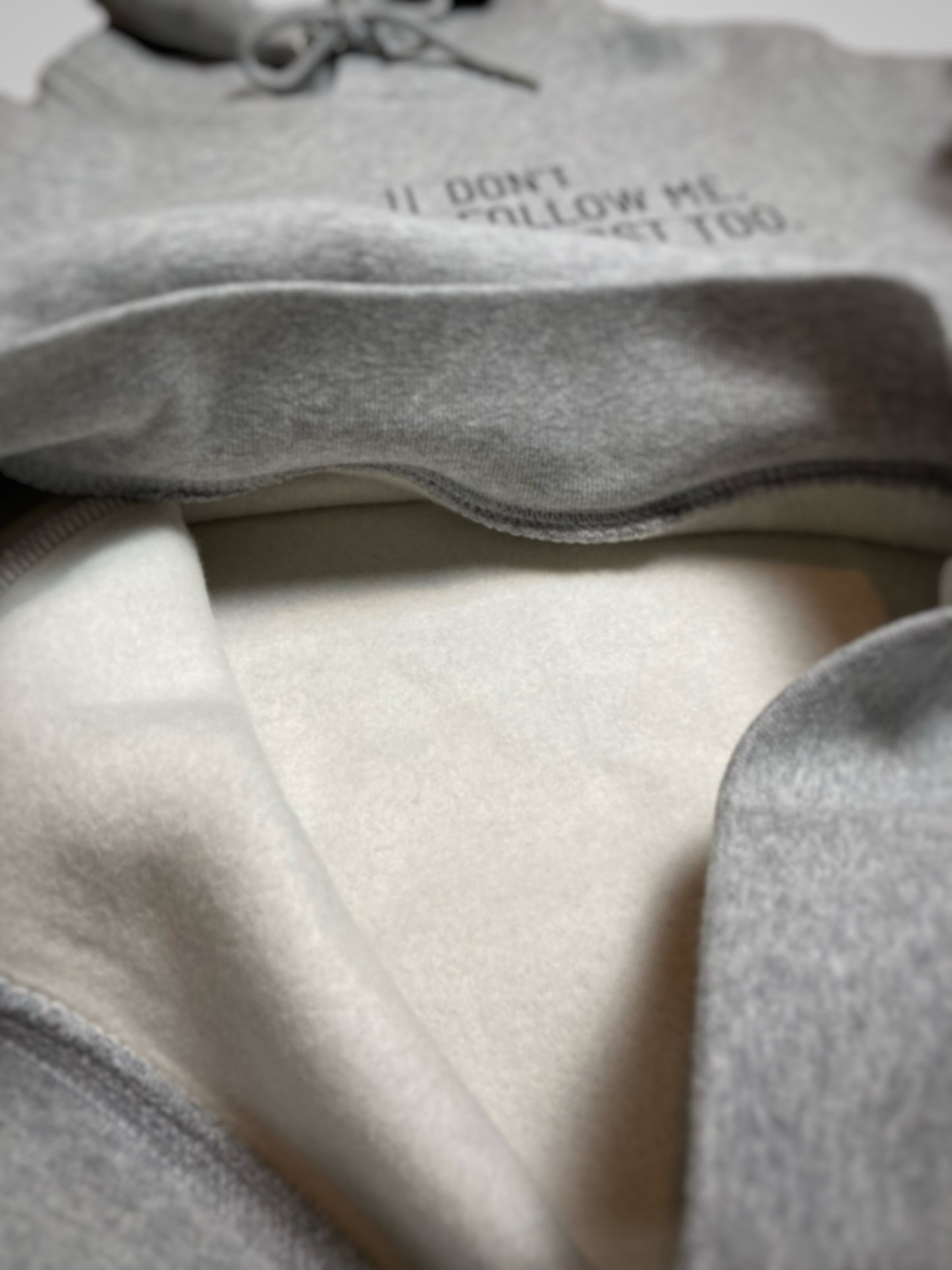 Hoodie Unisex 'Don't follow me, I'm lost too.': Heather Grey / Schwarz
