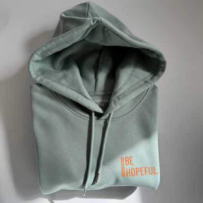 Hoodie Unisex 'Be hopeful.': Aloe / Neon Orange