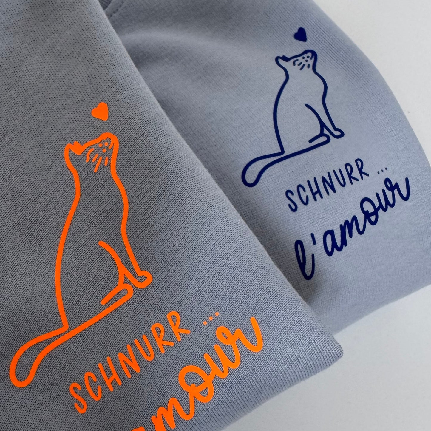 Sweatshirt Unisex Schnurr l‘amour, Serene Blue / Neon Orange