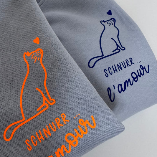 Sweatshirt Unisex Schnurr l‘amour, Serene Blue / Neon Orange