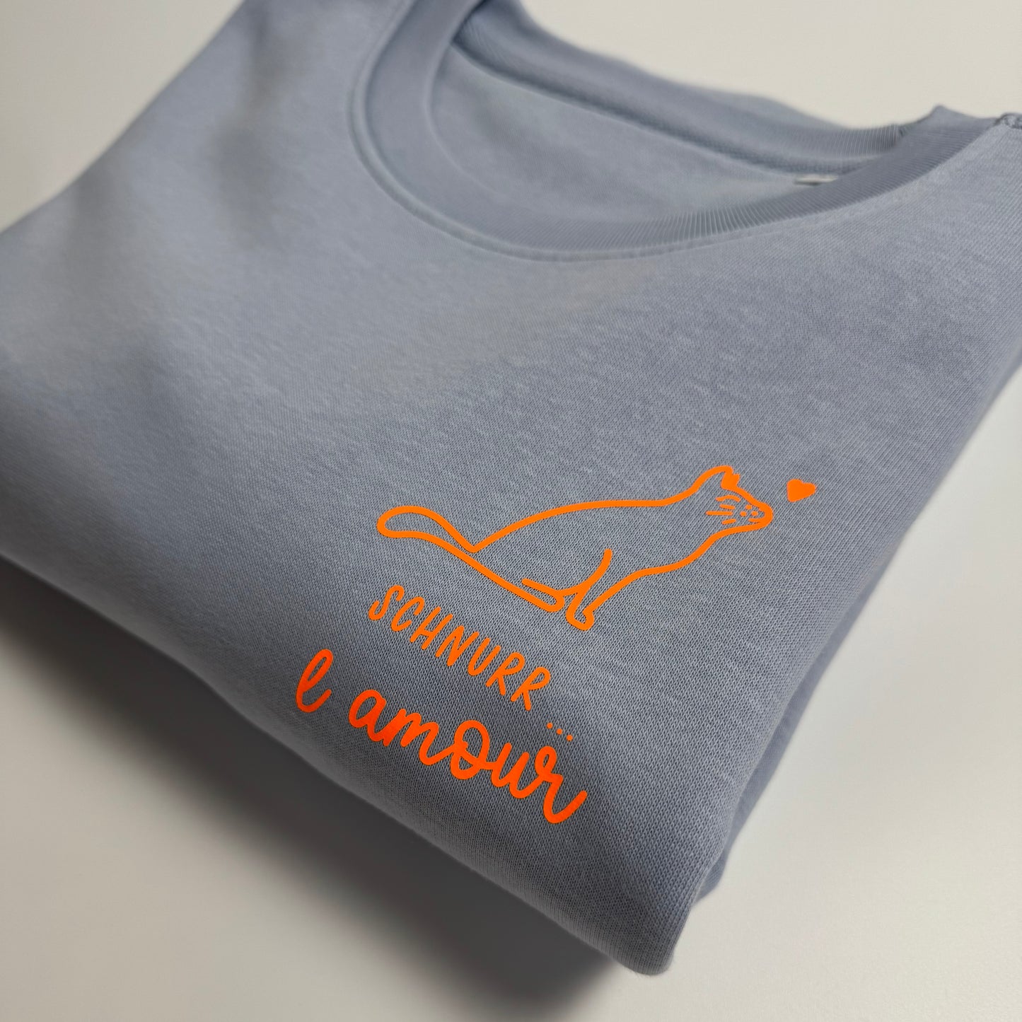 Sweatshirt Unisex Schnurr l‘amour, Serene Blue / Neon Orange