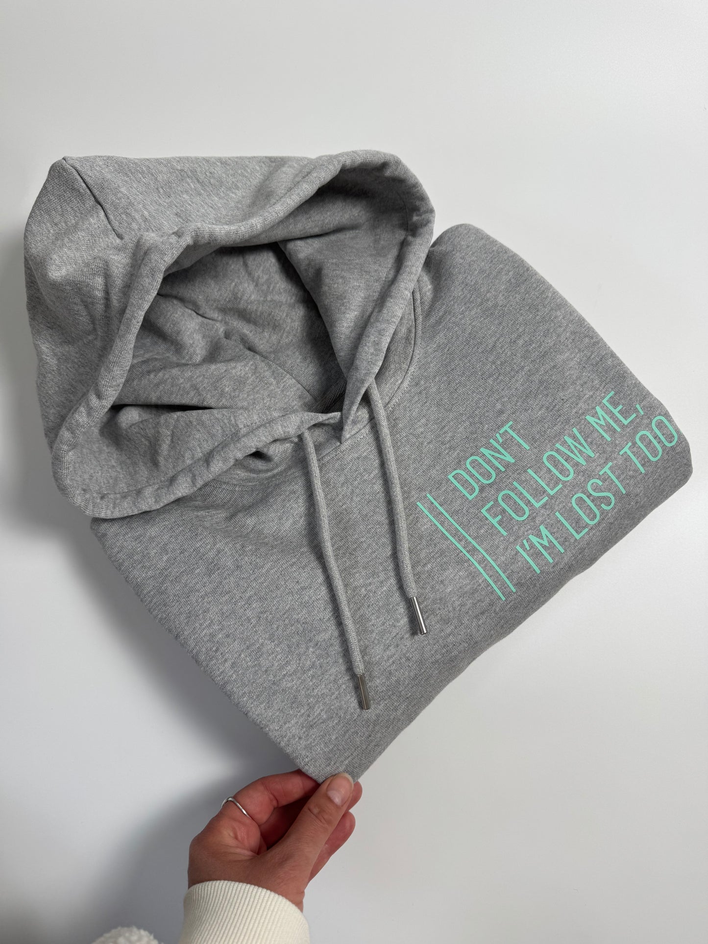 Hoodie Unisex 'Don’t follow me, I’m lost too.': Heather Grey / Blass Türkis